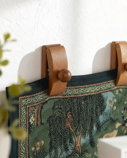 Sapele wood tapestry clips holding medieval forest tapestry - lifestyle detail shot